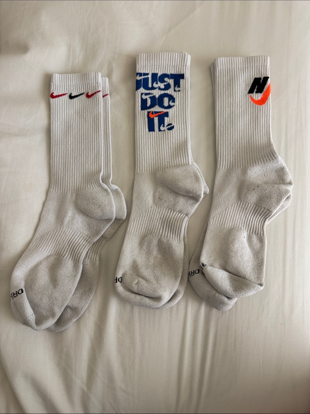 Nike White Crew Athletic Socks Trio with Multicolor Swoosh & Logo